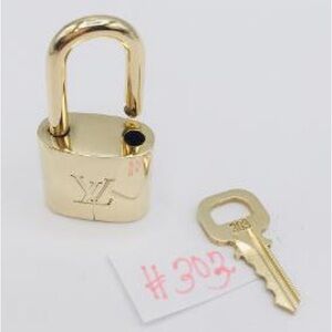 Authentic Louis Vuitton Lock and key 303